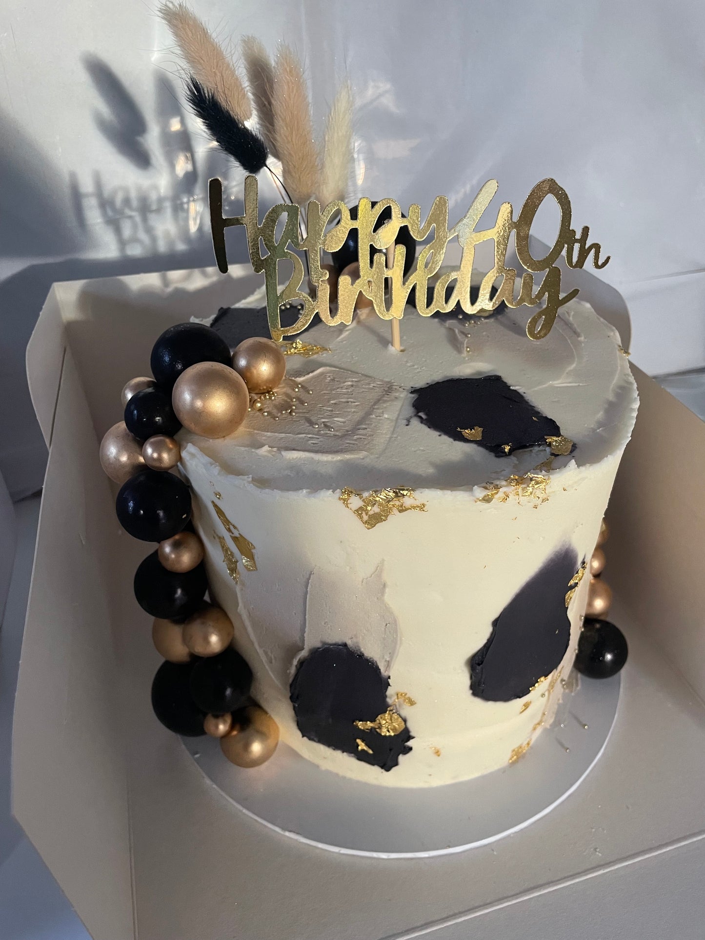 Black, gold & neutral cake